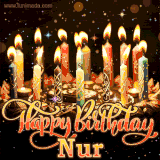 A glowing personalized birthday GIF with name Nur featuring lit candles with intricate designs, warm lighting, and the text 'Happy Birthday' in an elegant font.