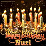 A glowing personalized birthday GIF with name Nuri featuring lit candles with intricate designs, warm lighting, and the text 'Happy Birthday' in an elegant font.