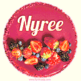 Beautifully decorated red velvet berry birthday cake with vibrant fruits and a glowing 'Nyree' name, adding a touch of sweetness and sparkle.