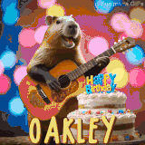Animated birthday GIF showing a capybara playing guitar and singing beside a birthday cake with the name Oakley in large letters and colorful bokeh lights in the background.
