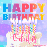 A vibrant animated name GIF with the words 'Happy Birthday Odalis' with colorful candles on a creamy cake. The background sparkles with pastel shades, adding a festive touch.