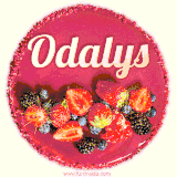 Beautifully decorated red velvet berry birthday cake with vibrant fruits and a glowing 'Odalys' name, adding a touch of sweetness and sparkle.
