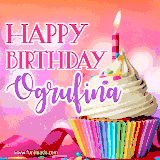 A vibrant birthday GIF featuring a rainbow-colored cupcake topped with white frosting, sprinkles, and a lit candle. The text reads 'Happy Birthday Ogrufina' in bold pink and violet letters with white outline.
