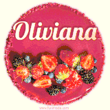 Beautifully decorated red velvet berry birthday cake with vibrant fruits and a glowing 'Oliviana' name, adding a touch of sweetness and sparkle.