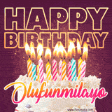 A colorful birthday cake topped with lit candles, with the words 'Happy Birthday Olufunmilayo' in bold glowing letters on a burgundy background. Animated flames add a festive touch.