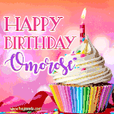 A vibrant birthday GIF featuring a rainbow-colored cupcake topped with white frosting, sprinkles, and a lit candle. The text reads 'Happy Birthday Omorose' in bold pink and violet letters with white outline.