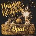 Celebrate Opal's birthday with a GIF featuring chocolate cake, a lit sparkler, and golden stars