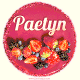 Beautifully decorated red velvet berry birthday cake with vibrant fruits and a glowing 'Paetyn' name, adding a touch of sweetness and sparkle.