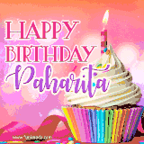 A vibrant birthday GIF featuring a rainbow-colored cupcake topped with white frosting, sprinkles, and a lit candle. The text reads 'Happy Birthday Paharita' in bold pink and violet letters with white outline.