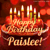 Beautifully decorated red velvet berry birthday cake with vibrant fruits and a glowing 'Paislee' name, adding a touch of sweetness and sparkle.