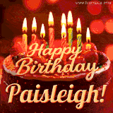 Beautifully decorated red velvet berry birthday cake with vibrant fruits and a glowing 'Paisleigh' name, adding a touch of sweetness and sparkle.