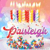 A cheerful white birthday cake with multicolor sprinkles, lit candles, and 'Paisleigh' written in vibrant letters, in an animated GIF.