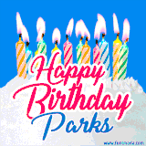 A cheerful animated GIF featuring colorful lit birthday candles on a white cake, with the text 'Happy Birthday Parks' in bold red and blue script on a bright blue background.