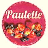 Beautifully decorated red velvet berry birthday cake with vibrant fruits and a glowing 'Paulette' name, adding a touch of sweetness and sparkle.