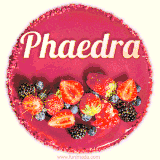 Beautifully decorated red velvet berry birthday cake with vibrant fruits and a glowing 'Phaedra' name, adding a touch of sweetness and sparkle.