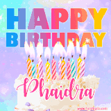 A vibrant animated name GIF with the words 'Happy Birthday Phaidra' with colorful candles on a creamy cake. The background sparkles with pastel shades, adding a festive touch.