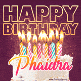 A colorful birthday cake topped with lit candles, with the words 'Happy Birthday Phaidra' in bold glowing letters on a burgundy background. Animated flames add a festive touch.