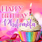 A vibrant birthday GIF featuring a rainbow-colored cupcake topped with white frosting, sprinkles, and a lit candle. The text reads 'Happy Birthday Philomela' in bold pink and violet letters with white outline.