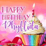 A vibrant birthday GIF featuring a rainbow-colored cupcake topped with white frosting, sprinkles, and a lit candle. The text reads 'Happy Birthday Phyllida' in bold pink and violet letters with white outline.