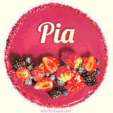 Beautifully decorated red velvet berry birthday cake with vibrant fruits and a glowing 'Pia' name, adding a touch of sweetness and sparkle.