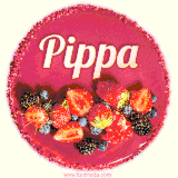 Beautifully decorated red velvet berry birthday cake with vibrant fruits and a glowing 'Pippa' name, adding a touch of sweetness and sparkle.