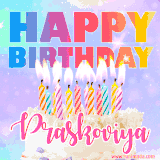 A vibrant animated name GIF with the words 'Happy Birthday Praskoviya' with colorful candles on a creamy cake. The background sparkles with pastel shades, adding a festive touch.