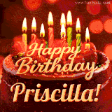 Beautifully decorated red velvet berry birthday cake with vibrant fruits and a glowing 'Priscilla' name, adding a touch of sweetness and sparkle.