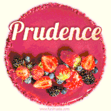 Beautifully decorated red velvet berry birthday cake with vibrant fruits and a glowing 'Prudence' name, adding a touch of sweetness and sparkle.