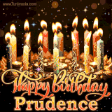 A glowing personalized birthday GIF with name Prudence featuring lit candles with intricate designs, warm lighting, and the text 'Happy Birthday' in an elegant font.