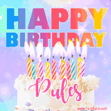 A vibrant animated name GIF with the words 'Happy Birthday Pules' with colorful candles on a creamy cake. The background sparkles with pastel shades, adding a festive touch.