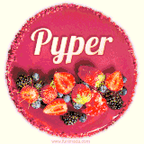 Beautifully decorated red velvet berry birthday cake with vibrant fruits and a glowing 'Pyper' name, adding a touch of sweetness and sparkle.