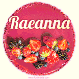 Beautifully decorated red velvet berry birthday cake with vibrant fruits and a glowing 'Raeanna' name, adding a touch of sweetness and sparkle.