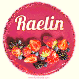 Beautifully decorated red velvet berry birthday cake with vibrant fruits and a glowing 'Raelin' name, adding a touch of sweetness and sparkle.