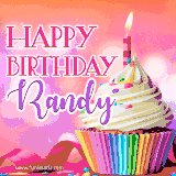 A vibrant birthday GIF featuring a rainbow-colored cupcake topped with white frosting, sprinkles, and a lit candle. The text reads 'Happy Birthday Randy' in bold pink and violet letters with white outline.