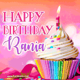 A vibrant birthday GIF featuring a rainbow-colored cupcake topped with white frosting, sprinkles, and a lit candle. The text reads 'Happy Birthday Rania' in bold pink and violet letters with white outline.
