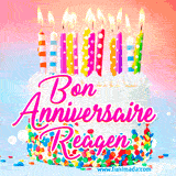 A white birthday cake covered in colorful sprinkles, topped with bright candles, and French text 'Bon Anniversaire Reagen' on a pastel gradient background in an animated GIF.