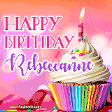 A vibrant birthday GIF featuring a rainbow-colored cupcake topped with white frosting, sprinkles, and a lit candle. The text reads 'Happy Birthday Rebeccanne' in bold pink and violet letters with white outline.