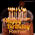 A rich chocolate cake topped with glowing birthday candles and surrounded by bright fireworks. The animated GIF displays the message 'Happy Birthday Remiel' in golden text.