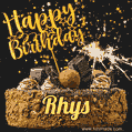 Celebrate Rhys's birthday with a GIF featuring chocolate cake, a lit sparkler, and golden stars