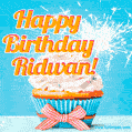 A cheerful animated GIF of a cupcake with creamy frosting, a red checkered ribbon, and a bright sparkler on top. The text 'Happy Birthday Ridwan!' is displayed in vibrant orange and red.