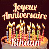 A Happy Birthday GIF in French featuring a festive birthday cake adorned with bright candles and the glowing text 'Joyeux Anniversaire Rihaan' in a cheerful style.