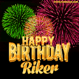 A captivating GIF with bursts of green, pink, and orange fireworks lighting up the night sky, accompanied by 'Happy Birthday Riker' in glowing golden text.