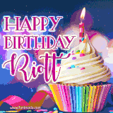 A festive animated GIF featuring a colorful cupcake with a single lit candle, sprinkles, and 'Happy Birthday Riott' text against a sparkling, celebratory background.