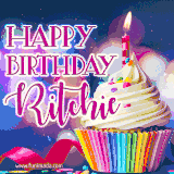 A festive animated GIF featuring a colorful cupcake with a single lit candle, sprinkles, and 'Happy Birthday Ritchie' text against a sparkling, celebratory background.