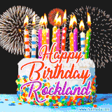 A lively happy birthday animated GIF showcasing a colorful birthday cake covered in sprinkles, topped with glowing candles, and surrounded by vibrant fireworks. The name 'Rockland' is featured in elegant script.