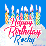 A cheerful animated GIF featuring colorful lit birthday candles on a white cake, with the text 'Happy Birthday Rocky' in bold red and blue script on a bright blue background.