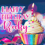 A festive animated GIF featuring a colorful cupcake with a single lit candle, sprinkles, and 'Happy Birthday Rocky' text against a sparkling, celebratory background.