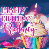 A festive animated GIF featuring a colorful cupcake with a single lit candle, sprinkles, and 'Happy Birthday Rodney' text against a sparkling, celebratory background.