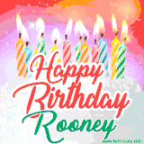 Bright birthday candles with rainbow flames on a cake, alongside the text 'Happy Birthday Rooney' in vibrant script in this celebratory animated GIF.