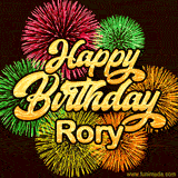 Golden text reading 'Happy Birthday Rory' surrounded by vibrant fireworks in red, green, and yellow, set against a dark background in this celebratory birthday GIF.